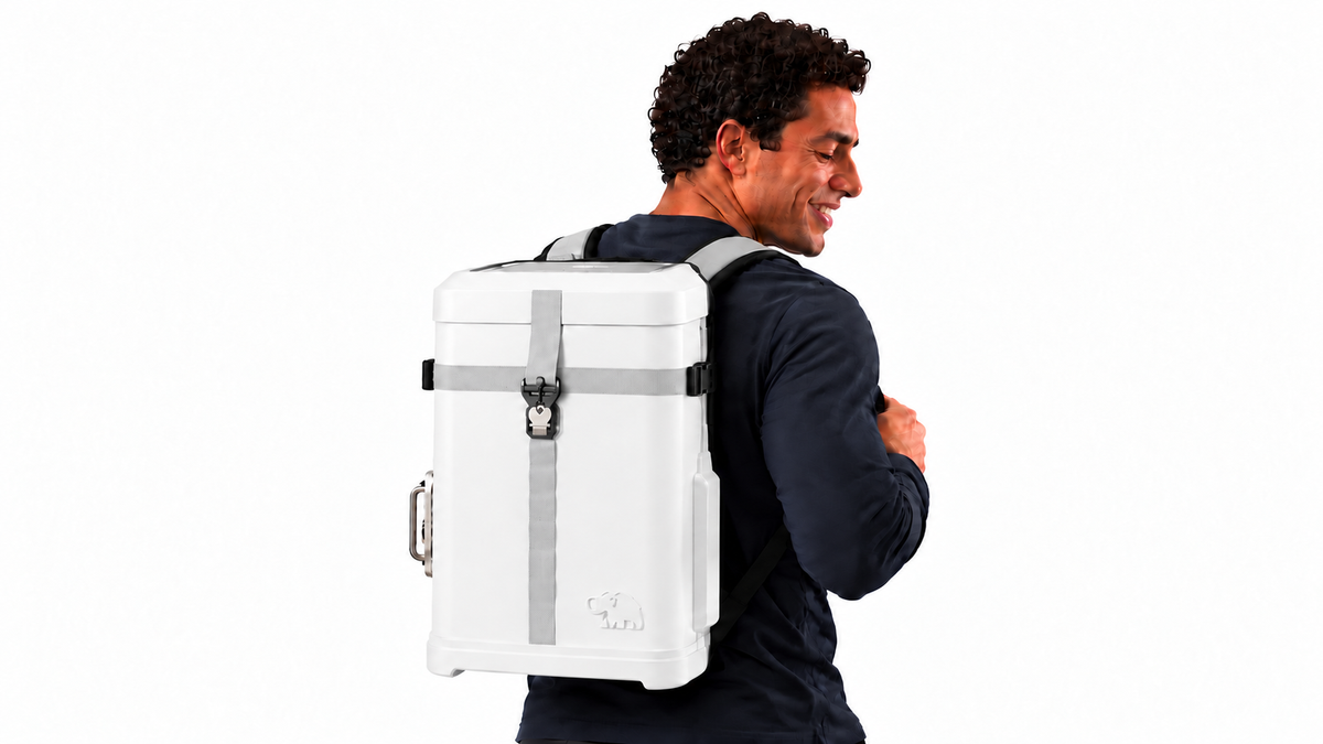 Person wearing a white SURV as a backpack