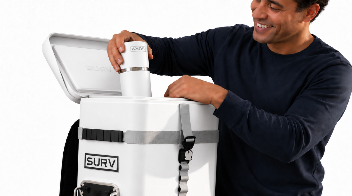 Loading a tumbler upside down into a white SURV
