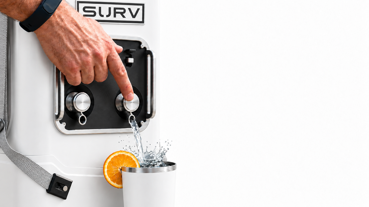 Pushing the tap on a white SURV to pour a drink